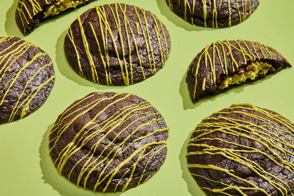 Gluten-Free Chocolate Pistachio Cookies on a green background