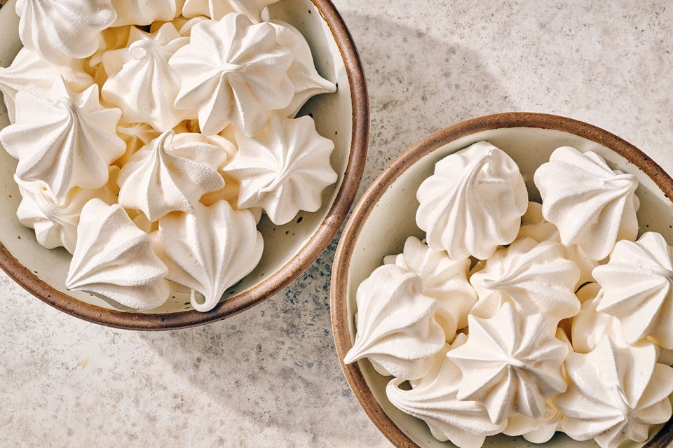 Meringue Kisses in bowls.