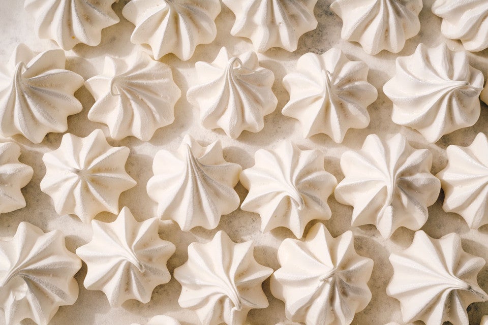 Looking down on neatly organized Meringue Kisses