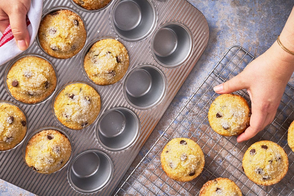 Removing Easy Chocolate Chip Muffins from a muffin pan