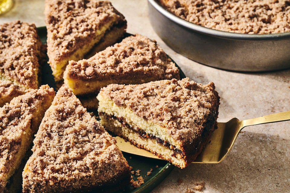 A slice of Cinnamon Streusel Coffee Cake on a pie spatula