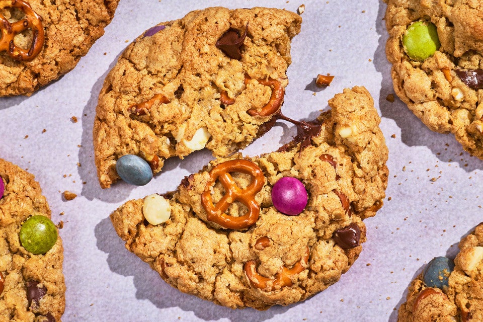 A broken Monster Cookie showing the crunchy bake