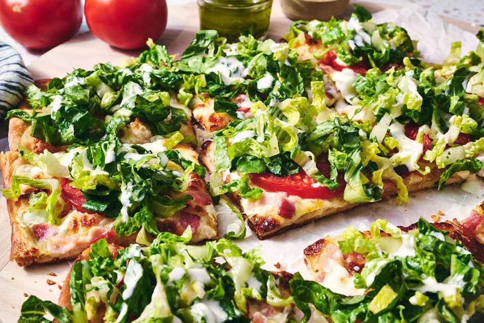 sliced BLT Pizza on a counter