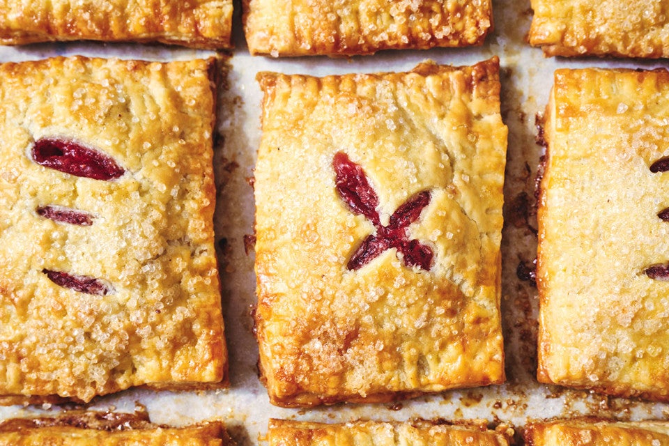 Strawberry Hand Pies on a baking sheet fresh out of the oven
