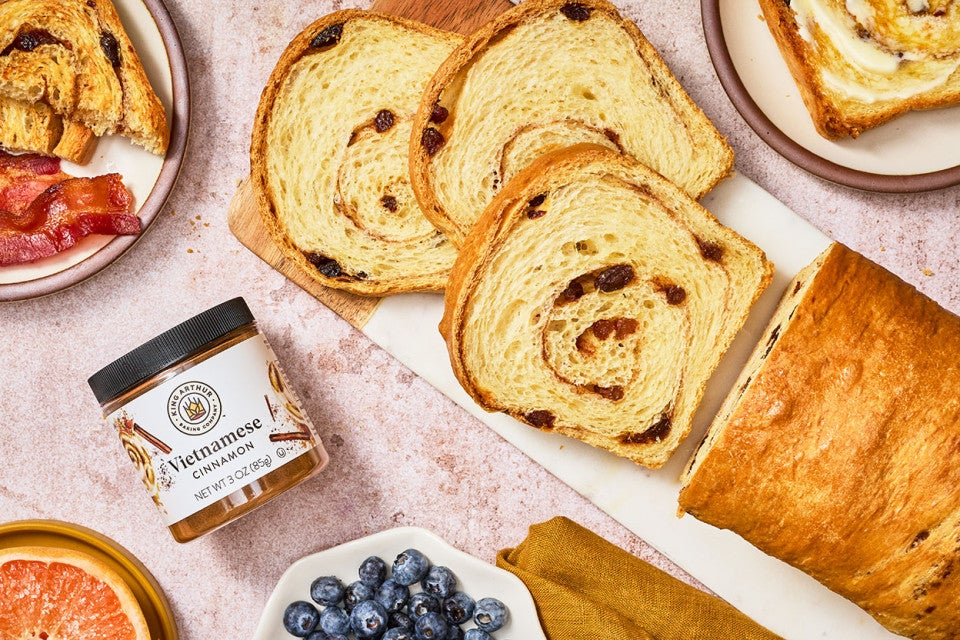 Sourdough Cinnamon Raisin Bread sliced on a counter and seen from above