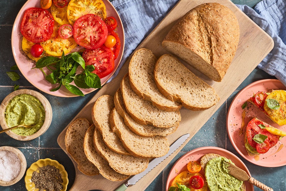 Slices of Seeded Multigrain Sourdough Bread on a cutting board