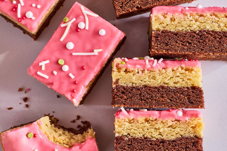 Neapolitan Sugar Cookie Bars showing layers of cookie and frosting