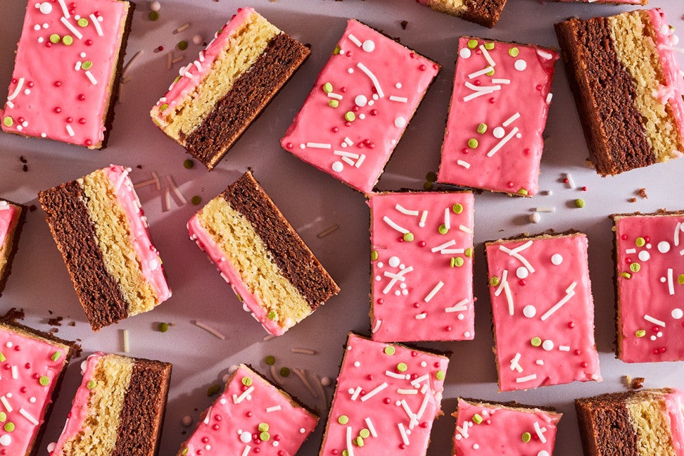 Neapolitan Sugar Cookie Bars scattered on a counter