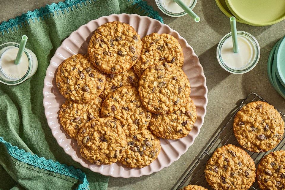 A pile of The Softest Oatmeal Raisin Cookies on a plate seen from above.