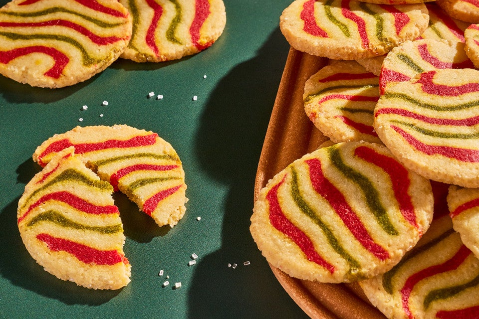 Ribboned Peppermint Shortbread Cookies on a green surface