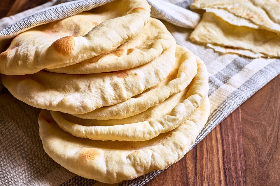 A stack of Golden Pita Bread on a counter