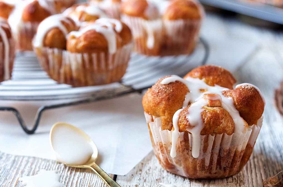 Glazed Cinnamon Apple Pull-Apart Rolls, fresh from the oven on a plate.