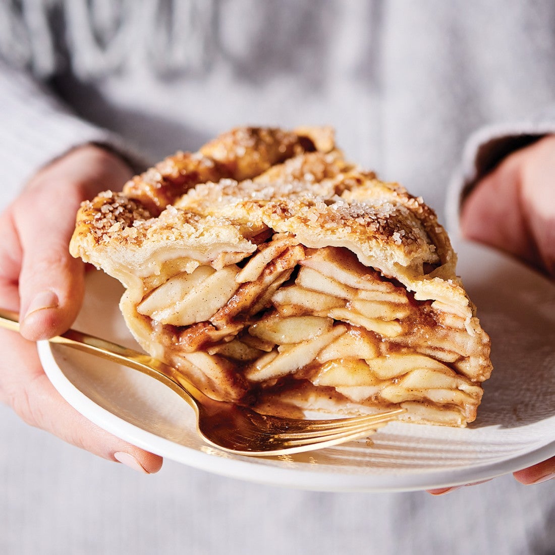 A sliced of Apple Pie on a plate
