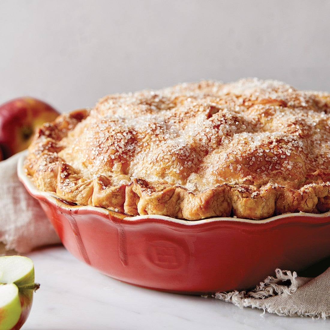 Apple Pie baked in a red pie dish