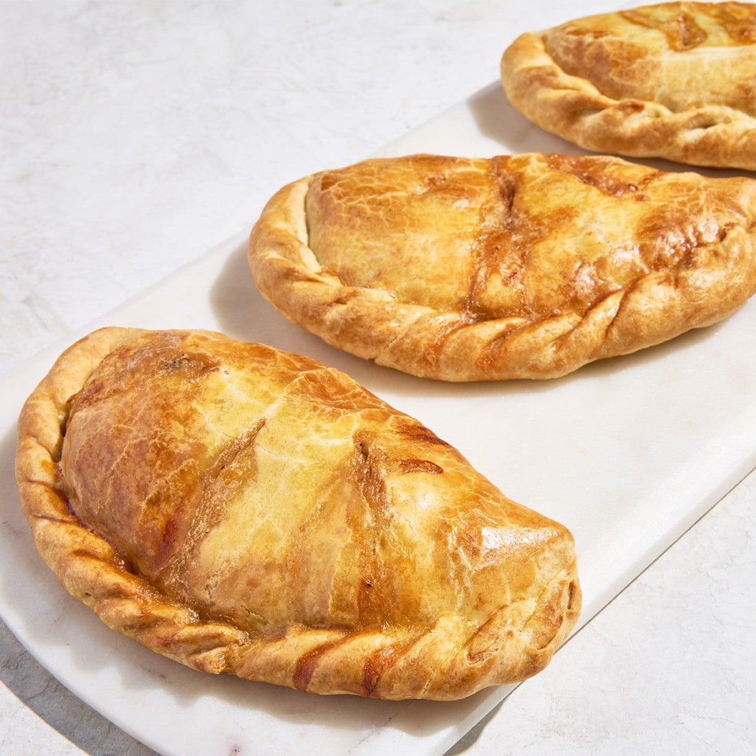 Black Bean Empandas on a serving tray
