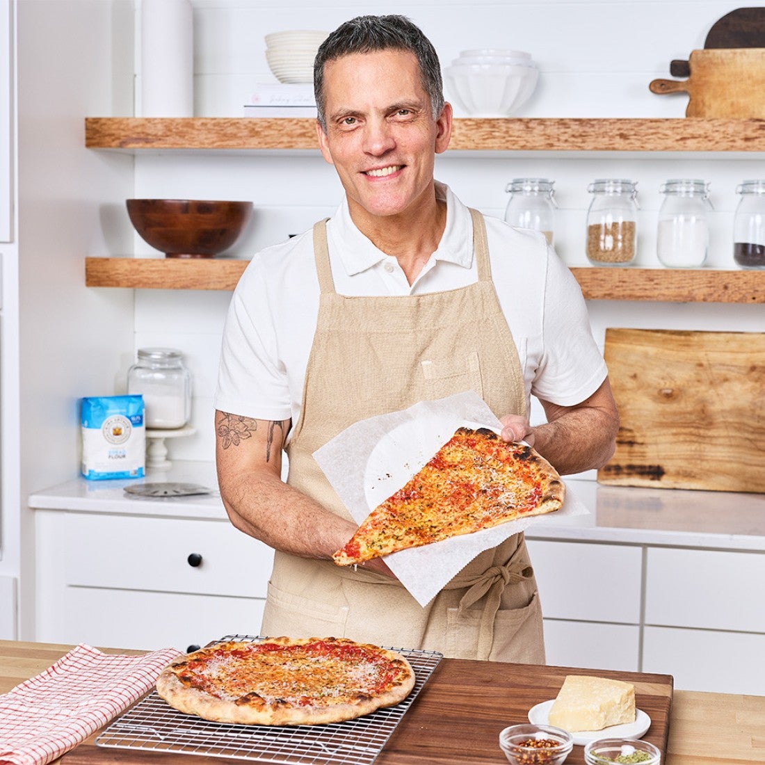 Martin with New York-style Pizza