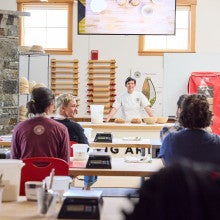 An instructor leading a class at the Norwich, VT baking school for King Arthur Baking