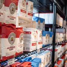 King Arthur Baking flour on racks inside the Denver, Colorado popup store
