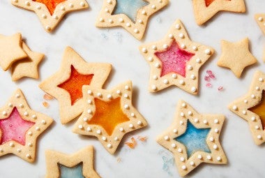 Star-shaped cookies with colored sugar filling