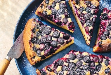 Several slices of Blueberry Breakfast Cake on a plate