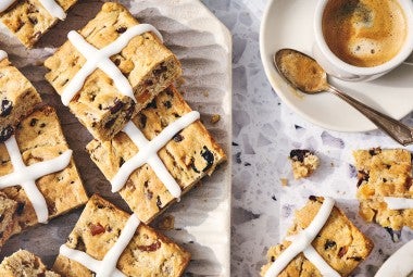 Gluten Free Hot Cross Biscuits and a cup of coffee seen from above