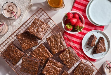 Fudge Brownies on a cooling rack seen from above.