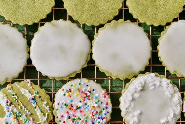 Glazed Matcha Cookies arranged on a cooling rack, seen from above