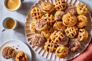 Lots of Mini Apple Pies arranged on a plate