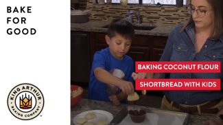 Ridge dipping cookies in chocolate with Libby