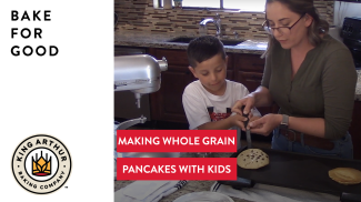 Libby and Ridge flipping a pancake