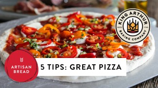 Title graphic over photo of pizza