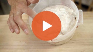 Play Button for Apple Cinnamon Sourdough Bread Video